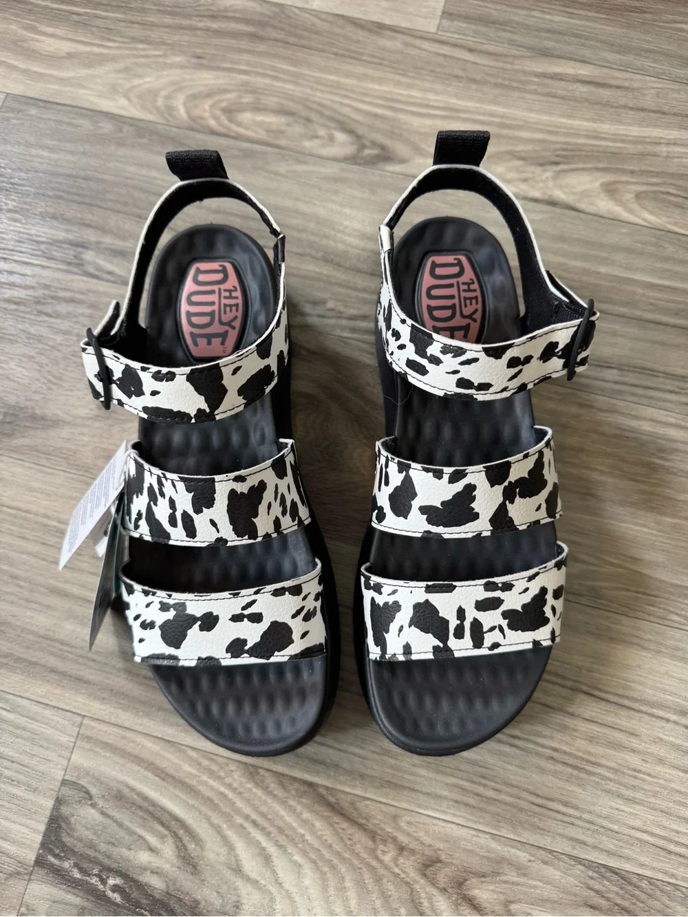 Hey Dude Delray Buckle Platform Sandal in Black/White Animal Cow Print Size 10